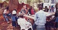 Juliana and Hartley King meeting the Lolkisale Village Council in 1996